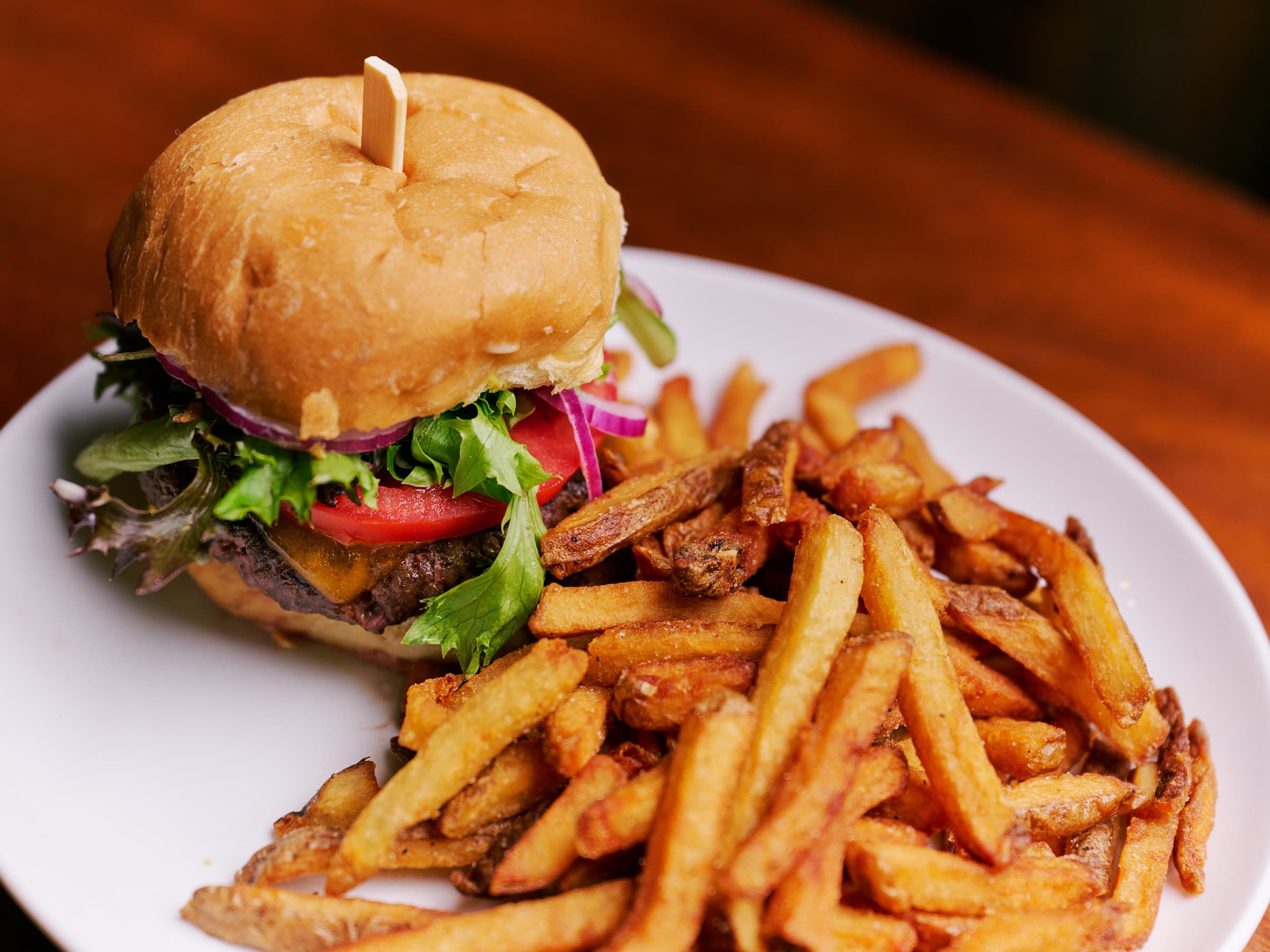 Cheeseburger and hand-cut fries at the Uptown bar